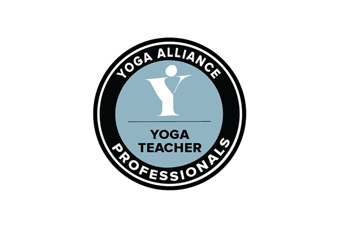 Yoga Alliance Professionals badge featuring a stylised yogi icon inside a circular black and blue emblem.